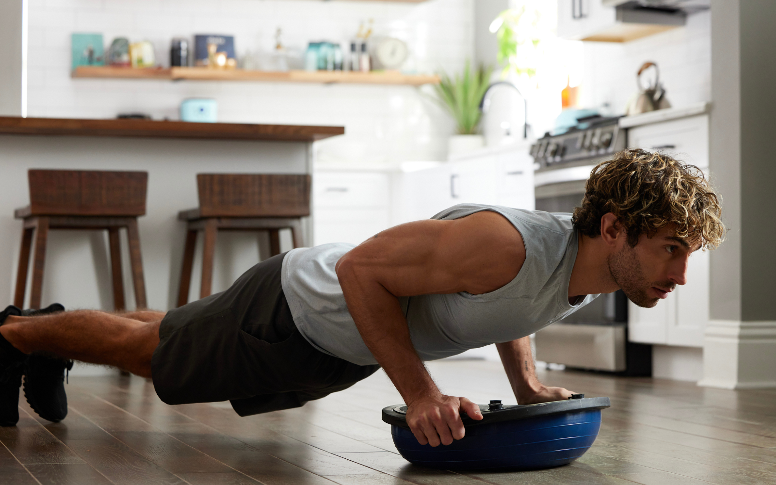 Guy doing push up on Balance Trainer Sport